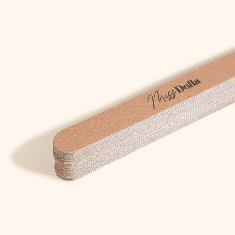 Professional nail file solution with Miss Dolla's disposable stickers.